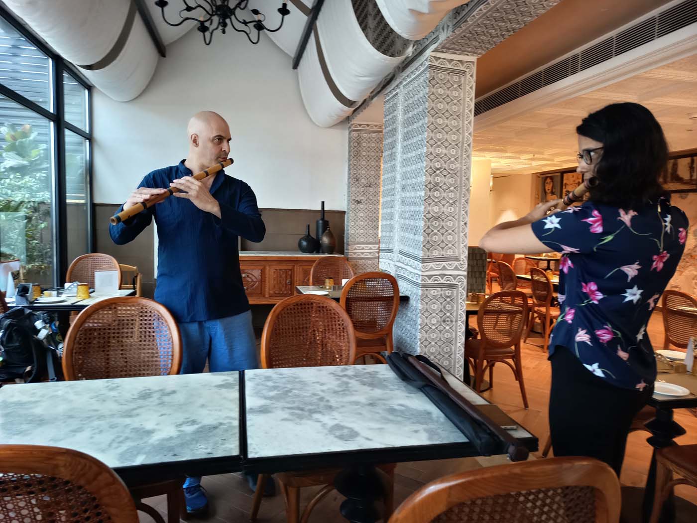 Bansuri Bliss Founder Dr. Kerry Kriger and member Krushna Bhatt playing bansuri together at the Delhi meetup
